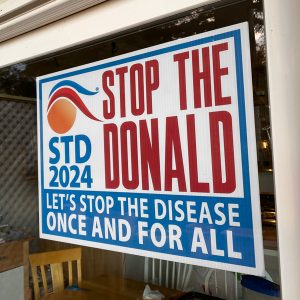 Anti Trump sign in window | | Democratic Political Gift for 2024