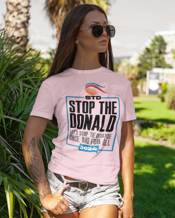 Woman wearing pink stop the donald T-shirt