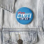 Vote Blue in 22 Button on Jacket